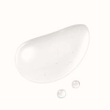A large, clear, tear-shaped drop of liquid with small bubbles inside, and two smaller clear drops below it, all on a white background.