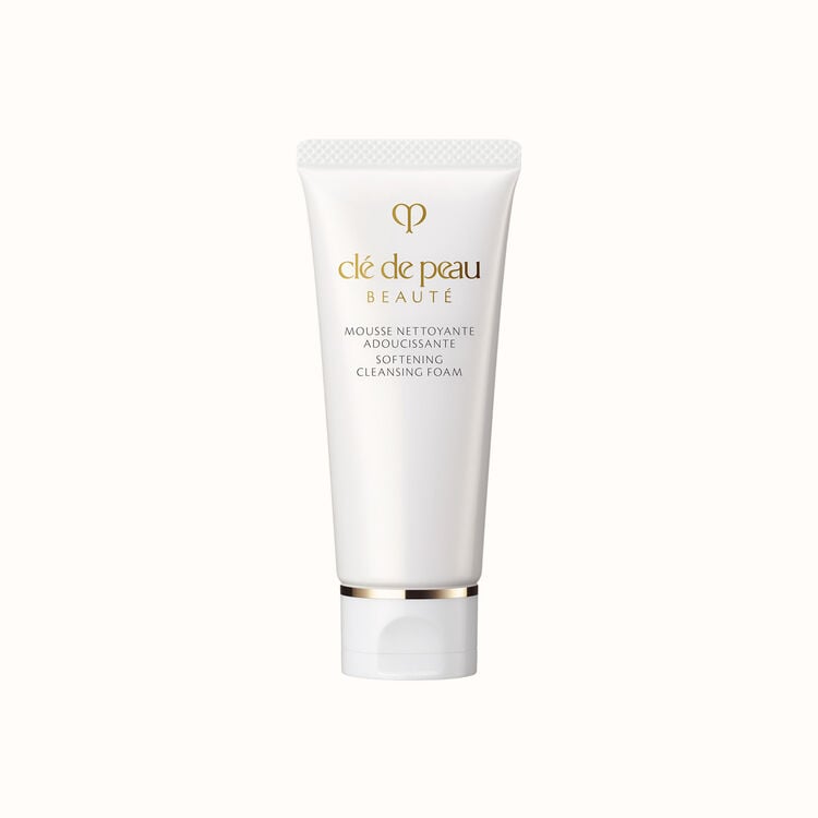 A white tube of Clé de Peau Beauté Softening Cleansing Foam with a gold band at the bottom.