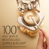 A dollop of thick, creamy, pale peach-colored skincare product with a subtle sheen is smeared across a white background.