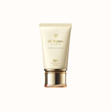 A tube of Clé de Peau Beauté UV Protective Cream with SPF 50+, in an elegant cream-colored tube with a gold cap.