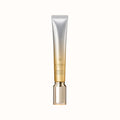 A gold and silver tube of Clé de Peau Beauté Wrinkle Smoothing Serum Supreme, with a metallic gold cap.