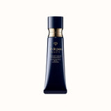 A slender, dark cosmetic tube of Radiant Cream Foundation SPF 25 standing upright with a metallic gold band near the top.